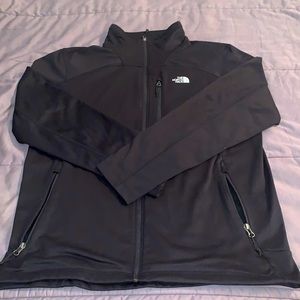 Black North Face Jacket.